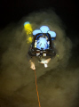   Siltout Diver emerges silt whilst surveying deep remote Kimberley Cave Western Asutralia. Depth 65m. Asutralia 65m  